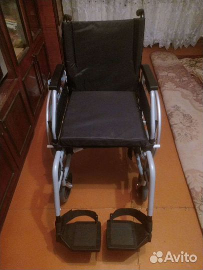 Инвалидная коляска