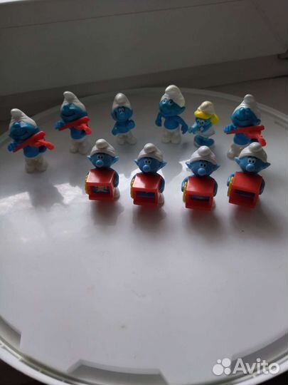 Игрушки из киндера смурфики и дино растишка
