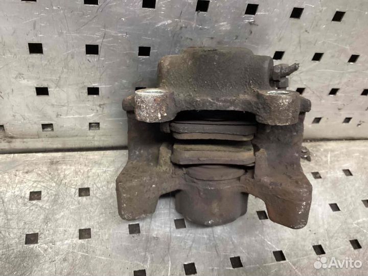 Суппорт задний левый Opel Omega