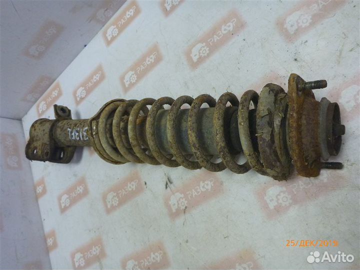 Амортизатор передний левый Лада 1111 1111