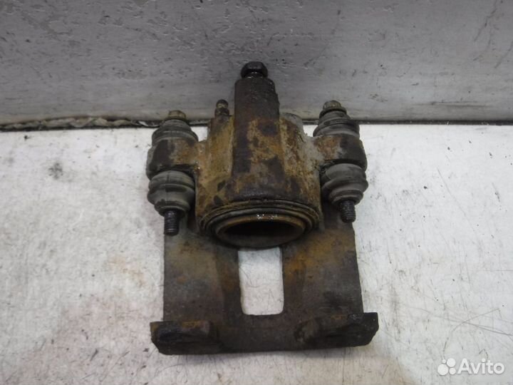 Суппорт тормозной задний Ford Explorer