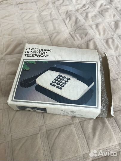 Стационарный кнопочный телефон