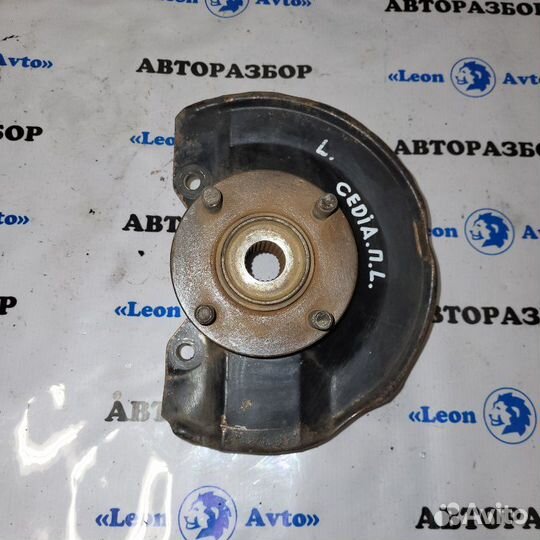 Поворотный кулак передний левый Mitsubishi Lancer