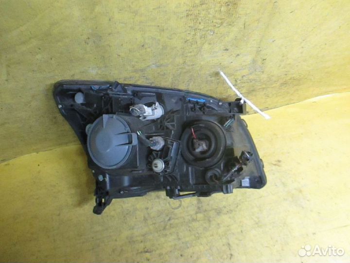 Фара левая Toyota Avensis AZT250