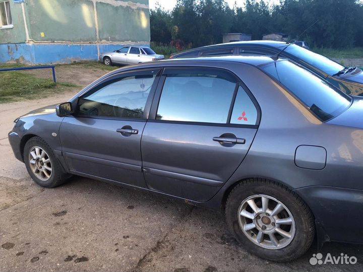 Mitsubishi Lancer 1.6 МТ, 2006, 250 000 км