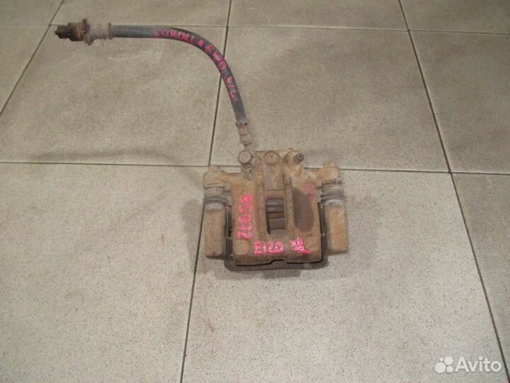 Суппорт задний левый Toyota Corolla (E120) 2000-2