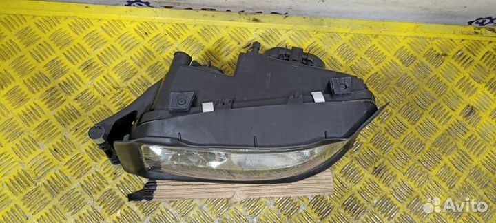 Фара основная (без эл-рег) левая Man Tgl Tgm Tga