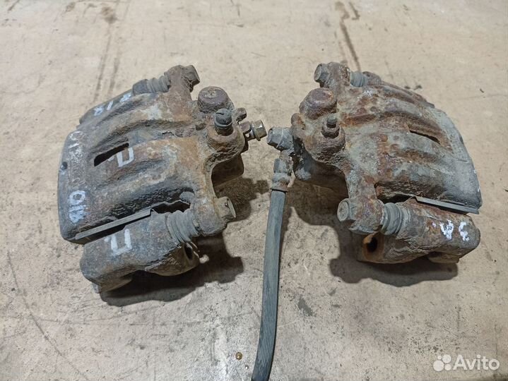 Суппорт тормозной задний Mazda CX-7 I рестайлинг