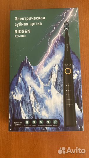 Электрическая зубная щетка