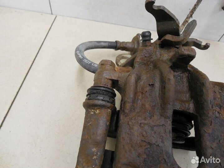 Суппорт задний левый Focus I 1998-2004