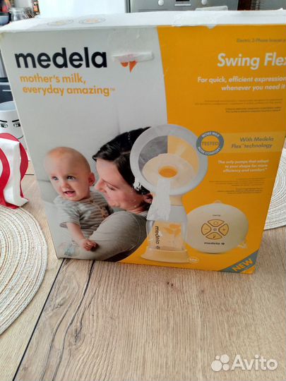 Молокоотсос электронный Свинг Флекс