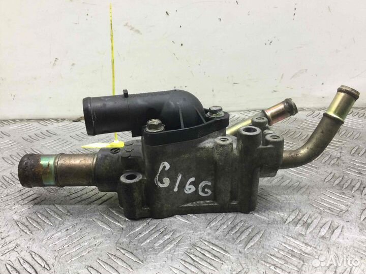 Корпус термостата Nissan Almera Tino 130499f600 Qg