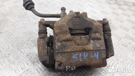 Суппорт тормозной передний правый opel astra J (5L