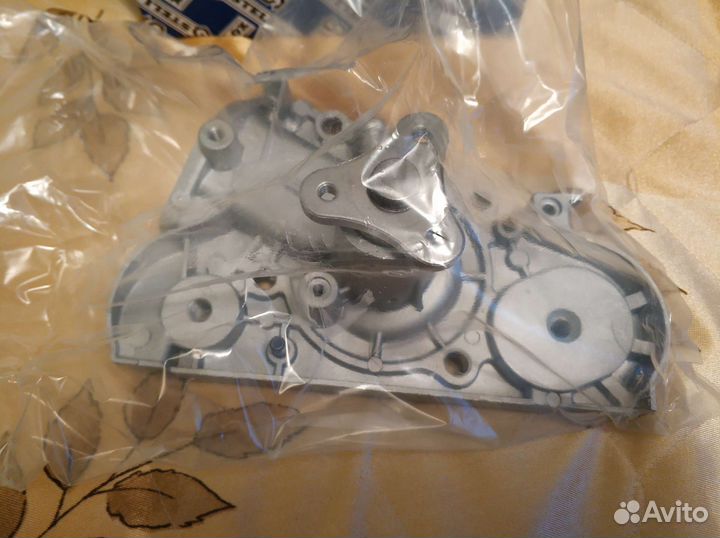 Помпа на киа спектра