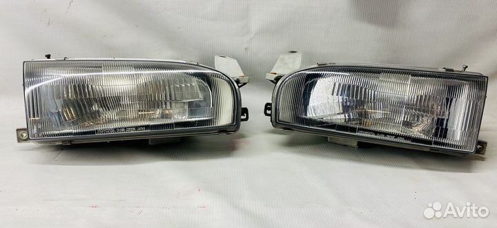 Фара toyota sprinter ае 100