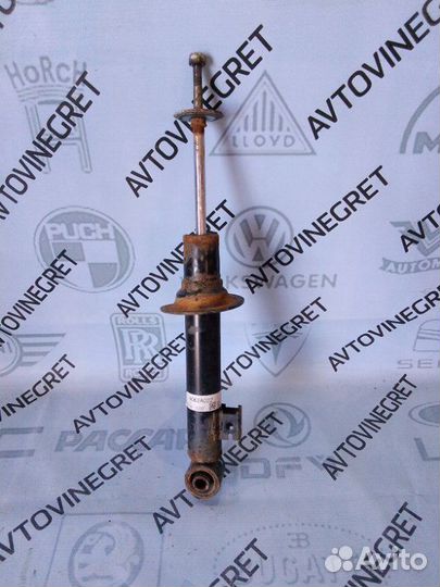 Стойка амортизатор передняя Mitsubishi L200