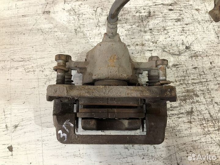 Суппорт тормозной задний Hyundai Getz