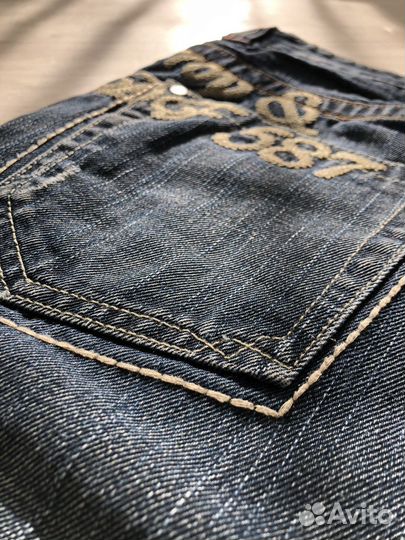 Джинсы «рваные» 46