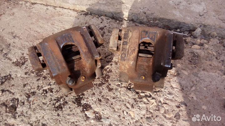 Суппорт тормозной передний - задний BMW E34