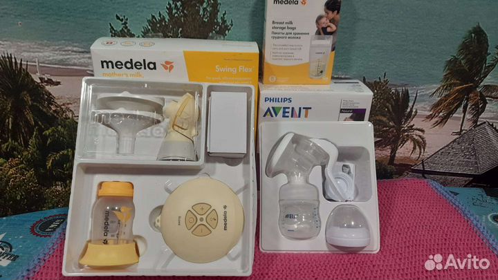 Молокоотсос Medela электрический
