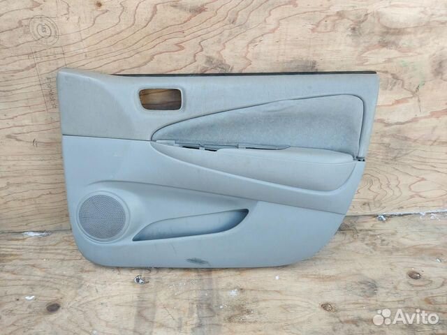 Обшивка двери передней правой Toyota Prius NHW11