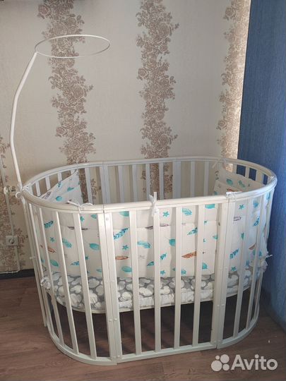 Детская кроватка с поперечным маятником