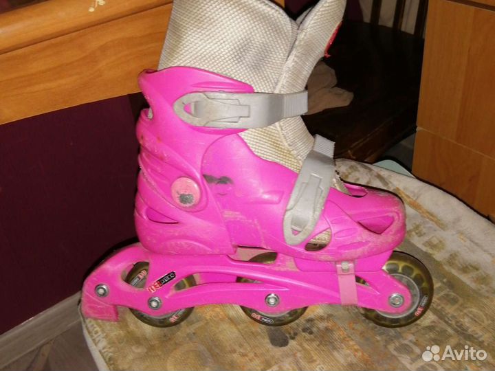 Роликовые коньки