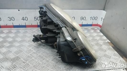 Фара левая mercedes benz E-class W211 (7NK09MR01)