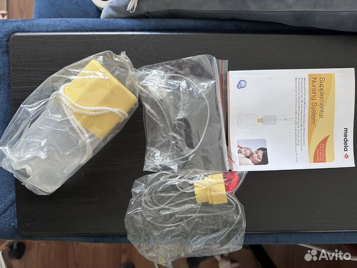 Дополнительная система для кормления medela