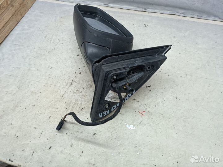 Зеркало левое Skoda Rapid