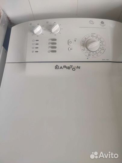 Стиральная машина с вертикальной загрузкой Аристон