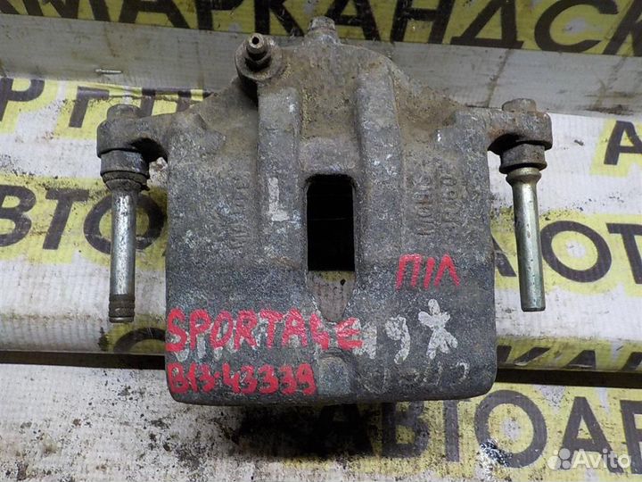 Суппорт передний правый KIA Sportage III (SL) 201