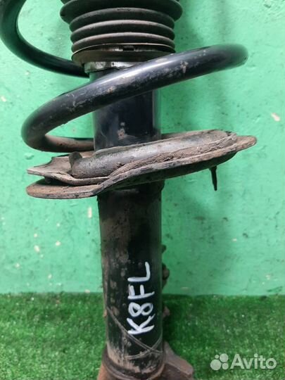 Стойка амортизатора передняя левая KIA Sportage 3