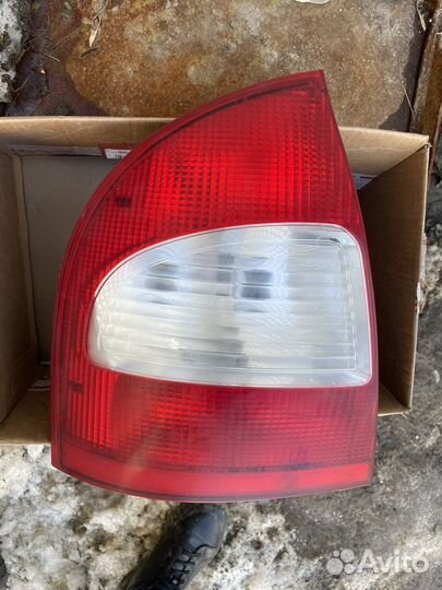 Задний левый фонарь Калина седан