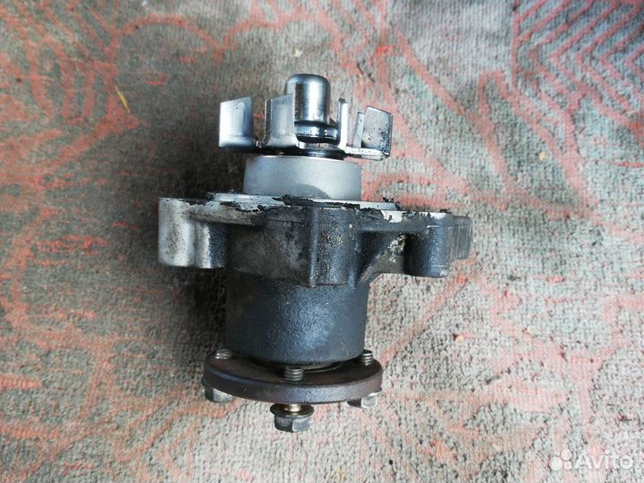 Помпа водяная Митсубиси Паджеро Мини 2