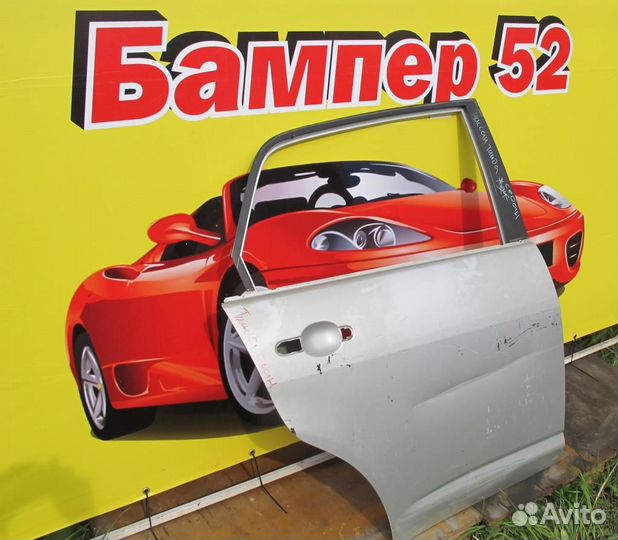 Nissan tiida 07- Дверь задняя правая серебро