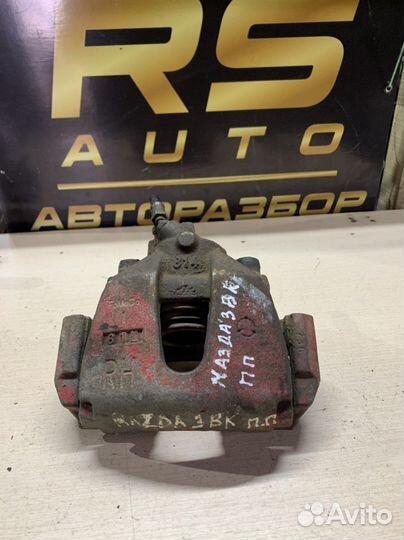 Суппорт передний правый Mazda 3 bk