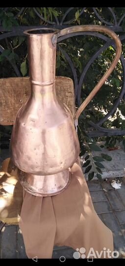 Огромный медный кувшин вышлю т, к