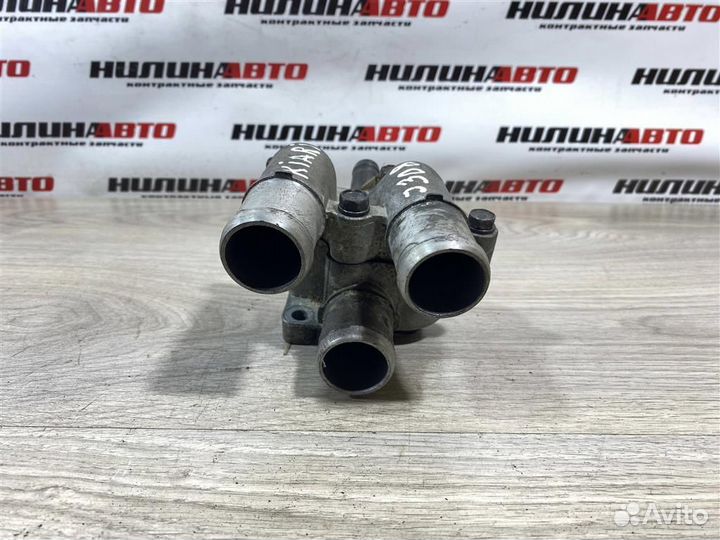 Корпус термостата Киа Рио 2 JB 1,4