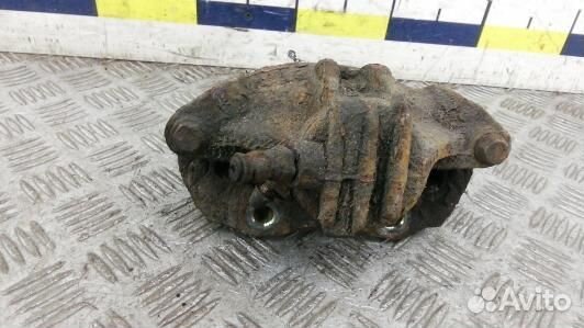 Суппорт тормозной передний левый peugeot partner 1