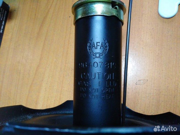 Амортизатор подвески передний левый Chevrolet