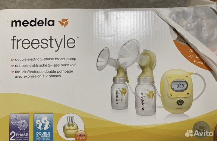 Молокоотсос medela новый