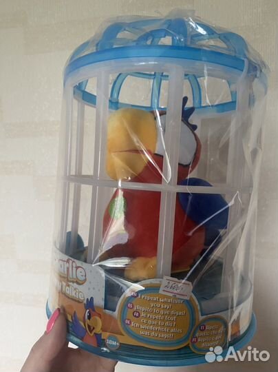 Игрушка говорящий попугай