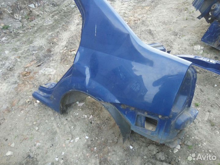 Крыло заднее рено логан