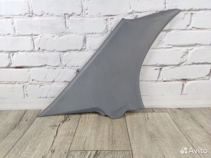 Обшивка стойки задней левой верхняя Carina E