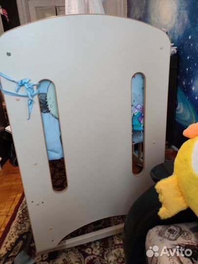 Детская кровать колесо-качалка