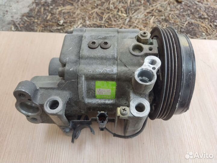 Компрессор кондиционера Subaru 73110AE050