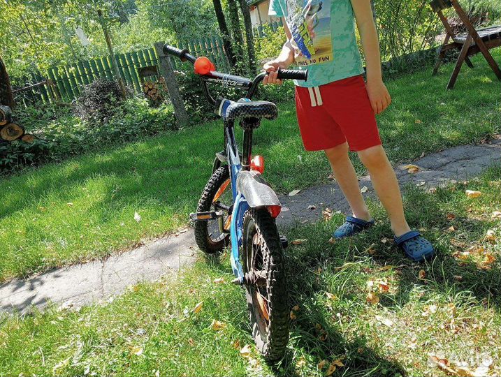 Детский велосипед с дополнительными