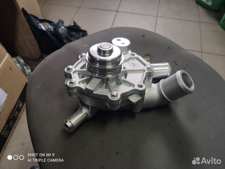 Помпа с корпусом 3.0 AJ Mazda Ford