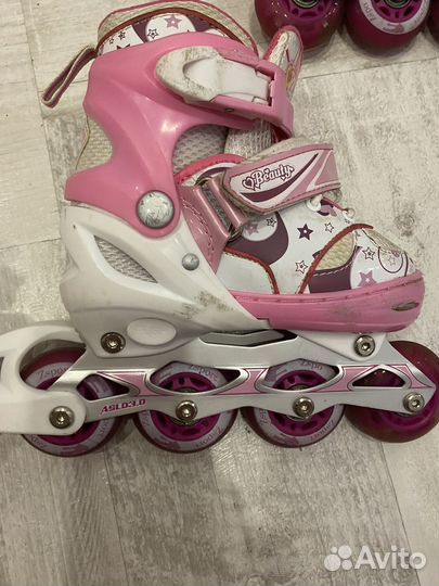 Роликовые коньки